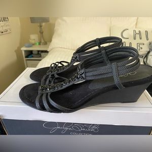 These dressy wedge sandals feature jeweled straps and elastic bands stretchy